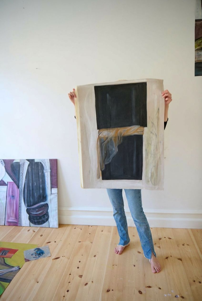 Marie Simonsson painting in studio